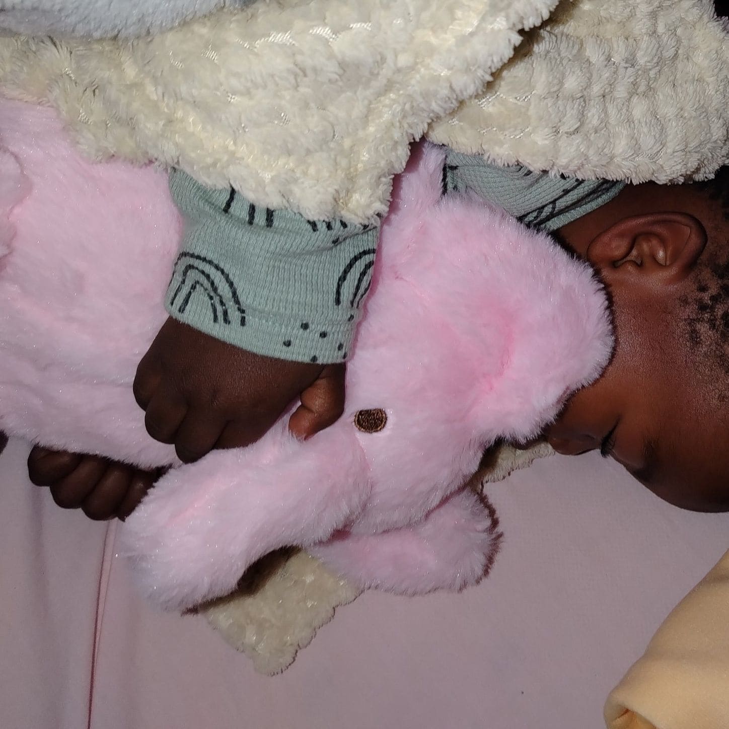 baby sindi with clean fresh clothes and about to prepare herself for feeding